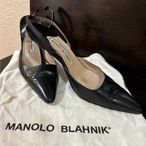 Stunning and timeless black Manolo Blahnik slingback heels.